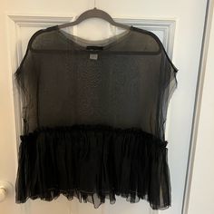 Louiza Babouryan 100%Silk Oversized Sheer Top. Nwot, Size M. Bottom Ruffle Laced In Gold Thread, Raw Hem Short Sleeves. This High-End Designer Top Hits At Hips And Can Be Worn With A Bralette Or A T Underneath, Or A Sweater On Top. It’s The Perfect Layering Piece. No Flaws, Brand New, Never Worn. Black Sheer Silk Tops, Black Sheer Silk Blouse, Sheer Black Silk Blouse, Sheer Silk Tops For Night Out, Black Silk Blouse For Summer, Black Silk Summer Blouse, Black Silk Tops For Spring, Black Silk Top For Spring, Designer Top