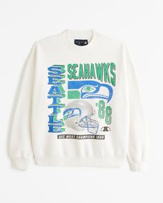 Classic sweatshirt in our softAF fleece fabric and oversized-fit silhouette, featuring Seattle Seahawks graphic detail at chest, crew neckline and banded hem and cuffs. Seattle Seahawks, Philadelphia Eagles, Crew Sweatshirts, Abercrombie Fitch, Hoodie Top, Fleece Fabric, Oversized Fits, Mens Sweatshirts, Crew Neck Sweatshirt