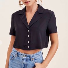 Only Have This In Black. 100% Polyester. Model Wearing Size Small. New With Tags. Available In S, M, L. Black Top With Back Button Closure For Spring, Cropped Tops With Button Closure For Night Out, Black Cropped Top With Buttons, Summer Black Top With Snap Buttons, Black Summer Top With Snap Buttons, Black Top With Snap Buttons For Summer, Black Tops With Snap Buttons For Summer, Black Tops With Snap Buttons For Night Out, Snap Button Tops For Night Out