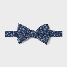 Update your formal accessories collection with this Bow Tie from Goodfellow & Co™. This stylish bow tie made from lightweight material with partial lining offers comfortable wear. It features a pre-tied style with an easy-close fastener for simple on and off. Pair it with your favorite dress shirt and suit jacket to complete your formal look. Goodfellow & Co™: Where style & fit are always in good company Spring Black Tie Adjustable Bow Tie, Navy Formal Ties For Summer, Dapper Formal Ties For Spring, Spring Dapper Adjustable Bow Tie, Dapper Spring Formal Ties, Dapper Adjustable Bow Tie For Spring, Formal Spring Dapper Ties, Dapper Summer Formal Suit And Tie Accessories, Classic Summer Bow Tie With Decorative Bow