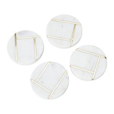 three white marble coasters with gold lines