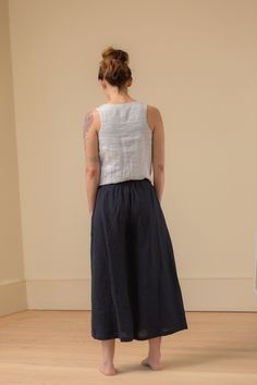 "DETAILS: - 100% linen pant - wide cropped legs - pockets - comfy wide elastic waist - mid-rise - waist is just below belly button LENGTH inseam is 23\" / 58cm from crotch point. MODEL is 5'3\" tall with B 32, W 28, H 35 wearing a size X-Small. Pictured above in mid-weight Midnight color. Select colors and sizes available Ready to Ship https://www.etsy.com/listing/983888219/small-batch-ready-to-ship-fog-culotte FABRIC: - The mid weight linen is 5.3oz / 150g. It is very soft and has a a nice line Wide Leg Ramie Bottoms With Pockets, Relaxed Fit Linen Cropped Bottoms, Relaxed Fit Cropped Linen Bottoms, Effortless Wide Leg Linen Pants, Summer Cropped Bottoms With Loosely Fitted Hips, Linen Bottoms With Elastic Waistband In Flax Color, Linen Wide Leg Cropped Pants With Elastic Waistband, Linen Bottoms With Elastic Waistband And Loose Fit, Flax Linen Bottoms With Elastic Waistband