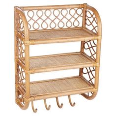 a bamboo and wicker shelf with three shelves