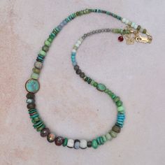 Opal, labradorite, roman glass, blue moonstone, turquoise, brass, neon apatite, chrysocolla, and one ruby Adjustable 16-18" All natural stones slight variations in color will occur Handmade in CT Riverstone Jewelry Turquoise Labradorite Spiritual Necklace, Spiritual Turquoise Labradorite Necklace, Green Labradorite Necklaces With Natural Stones, Bohemian Turquoise Chrysoprase Necklace, Bohemian Chrysocolla Beaded Necklaces For Jewelry Making, Bohemian Chrysocolla Round Bead Necklace, Bohemian Single Strand Amazonite Jewelry, Bohemian Amazonite Single Strand Jewelry, Artisan Chrysocolla Necklace