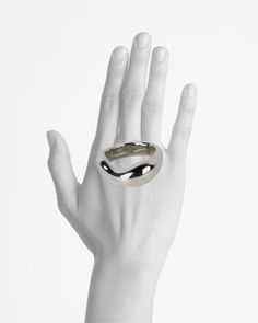 Modern accent ring with an organic shape. Cloud ring takes inspiration from Anish Kapoor's famous Cloudgate sculpture. Cloud ring effortlessly wraps around the finger. The hard metal renders itself fluid and subdued through the organic curves of the Cloud ring. Sterling Silver comes with two finishes; POLISHED AND MATT.Wrapped in plastic-free & recycled packaging. Sculptural Jewelry With Polished Finish For Formal Occasions, Modern Dome Ring With Open Band, Modern Wide Band Ring With Polished Finish, Modern Twist Dome Ring With Polished Finish, Modern Dome Ring With Polished Finish, Contemporary Open Ring With Polished Finish, Metal Rings For Formal Occasions With A Modern Twist, Modern Wide Band Ring With Polished Open Band, Modern Curved Rings With Polished Finish