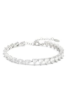 You'll love the shimmer of this classic tennis bracelet lined with heart-cut and pear-cut cubic zirconia. 6" length; 2" extender Sterling silver/14k-gold or rhodium plate/cubic zirconia Imported Bracelet In Silver, Tennis Bracelet, Pear Cut, Womens Jewelry Bracelets, Rhodium Plated, Diamond Bracelet, Cubic Zirconia, Silver Bracelet, Pear