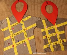 two shirts made out of construction paper with red markers on them