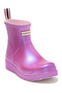 Iridescence makes more than a splash on a rubber rain boot set on a grippy lugged sole—for traction on the street and all across your rainy-day wardrobe. 1 1/4" heel; 3/4" platform (size 9) 6 1/4" shaft Pull-on style with adjustable buckle strap In hot or humid weather, natural latex rubber releases a protective wax film; simply wipe it off with a damp cloth A pristine finish and shine are easily restored with regular use of Hunter Boot Buffer or Instant Boot Shine Rubber upper/textile lining/ru Rain Boots Fashion, Hunter Boot, Rain Boots Women, Metallic Boots, Fantastic Shoes, Hunter Shoes, Women Hunters, Rain Boot, Trendy Sneakers