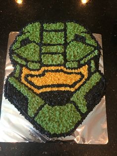 there is a cake made to look like the green lanterner from teenage mutant ninja