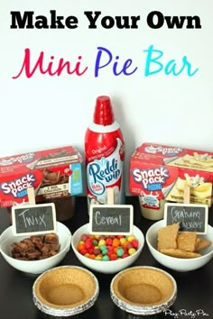 mini pie bar with candy bars, marshmallows and graham's crackers