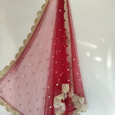 More dupatta here in our collection https://www.etsy.com/shop/neelcreations/?section_id=15880219 Net with embroidery Indian dupatta. It has beautiful golden border. Scallop border with dull gold color. ★ The mirror on all over net is not real. ★ It can be made in other colors and longer in length also. We can also change the border if you want. Approximate length 95 inches. We can increase length so please contact us if you want longer dupatta. These designer dupattas are very much in trend. Pai Kundan Lehenga With Sheer Dupatta For Diwali, Anarkali Lehenga With Dupatta In Nida Fabric, Festive Kundan Sharara With Sheer Dupatta, Red Kundan Saree With Sheer Dupatta, Red Traditional Wear With Sheer Dupatta In Nida, Red Saree With Sheer Dupatta And Kundan Material, Festive Anarkali Dupatta In Nida, Festive Anarkali Dupatta, Red Lehenga With Sheer Dupatta In Chinon