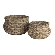 two wicker baskets sitting next to each other