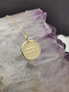 "To see all zodiac necklaces follow the link bellow https://www.etsy.com/shop/EvangelosJewels?ref=seller-platform-mcnav&section_id=29250426 Dainty 14k Solid Gold Aquarius Zodiac Necklace, Aquarius Symbol Pendant, Zodiac Solid Gold, Personalized Aquarius Sign Zodiac, Custom Zodiac ♥ Material of pendant and chain: Solid Gold 14K ♥ Packaging: All of our jewelry is beautifully boxed and ready for gifting For more personalized designs take a look here: ♥ www.etsy.com/listing/631444472 ♥ www.etsy. Spiritual 14k Gold Zodiac Jewelry, 14k Gold Zodiac Sign Necklace With Round Pendant, Celestial Zodiac Sign 14k Gold Necklaces, 14k Gold Celestial Zodiac Necklaces, 14k Gold Zodiac Sign Pendant Necklace, Aquarius Jewelry, Aquarius Symbol, Aquarius Necklace, Aquarius Sign