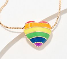 Show your support and share your beliefs with this heart-shaped pendant necklace on display. A colorful enameled rainbow radiates from one side of the heart, while the words "Love Wins" are proudly displayed on the other. From the Joan Rivers Classics Collection®. Rainbow Enamel Jewelry For Gifts, Rainbow Enamel Jewelry For Gift, Rainbow Enamel Jewelry As Gift, Rainbow Enamel Jewelry Gift, Multicolor Heart Pendant Jewelry For Mother's Day, Rainbow Jewelry For Valentine's Day Gift, Multicolor Heart Pendant Necklace For Valentine's Day, Multicolor Heart Charm Jewelry For Anniversary, Mother's Day Multicolor Heart Charm Necklace