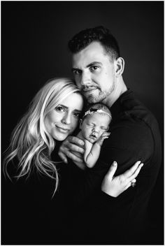 Black and white portrait of mom, dad, and newborn baby girl. Dad is holding baby girl on his arm and mom is hugging her. Family Portrait Poses Newborn, Family Portrait Poses With Newborn, New Born Baby Girl Photoshooting With Family, Family Shoot Newborn, Simple Family Newborn Pictures, Family Photoshoot Ideas With Newborn, Family Picture Ideas With Newborn, Family Portrait Newborn, Family Pic With Newborn