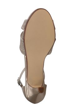 Shimmery straps and a metallic finish illuminate an event-ready sandal lifted by a contemporary kitten heel. 1 3/4" heel Synthetic upper, lining and sole Imported Metallic Heels With Heel Strap And Single Toe Strap, Metallic Low Heel Shoes With Heel Strap, Metallic Ankle Strap Sandals With 4-inch Heel, Metallic Sandals With Heel And Ankle Strap, Metallic Ankle Strap Sandals For Formal Events, Metallic Ankle Strap Sandals For Formal Occasions, Glamorous Ankle Strap Kitten Heels With Heel Strap, Glamorous Kitten Heels With Ankle Strap, Metallic Low Heel Sandals For Evening