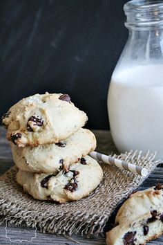 chocolate chip cookies and milk on a table