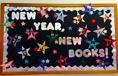 a bulletin board with new year, new books written in different colors and stars on it