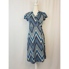 Everly Grey Kathy Wrap Dress, Xs, Blue Chevron, Short Sleeve, Midi, Stretchy, Lightweight. 96% Polyester, 4% Spandex. Measurements From The Top Of The Dress To Bottom Hem - 38" Pit To Pit - 14" This Beautiful Dress Is Preloved And In Excellent Condition. Spring Blue Midi Dress With Surplice Neckline, Blue Midi Dress With Surplice Neckline For Spring, Stretch Blue Sundress, Blue Wrap Dress With Surplice Neckline For Summer, Blue Spring Dress With Surplice Neckline, Blue Wrap Dress With Surplice Neckline For Beach, Blue Surplice Neckline Dress For The Beach, Blue Surplice Neckline Dress For Beach, Blue Dress With Surplice Neckline For Beach