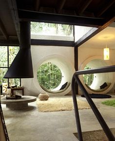 the inside of a house with circular windows