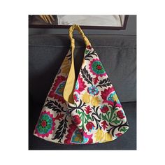 This hobo boho bag is made of ethnic tulip design printed fabric and yellow canvas linen fabric.  This origami hobo bag can be reversed so you can turn it inside out and use it two ways.  Normally this is a shoulder bag and has a handle made of its own yellow fabric and length is 25 cm, 9,84".  It is possible to make the handle longer enough to use this origami bag as a crossbody sling bag.  If you would like to use it as a crossbody bag, just please kindly convo me, how tall are you and which c Bohemian Reversible Shoulder Bag, Bohemian Reversible Hobo Bag For Daily Use, Bohemian Multicolor Reversible Bag, Bohemian Reversible Hobo Tote Bag, Bohemian Reversible Hobo Bag For Everyday Use, Bohemian Reversible Hobo Bag For Travel, Bohemian Multicolor Canvas Bag For Everyday, Multicolor Bohemian Canvas Bag For Everyday, Bohemian Multicolor Canvas Bag For Everyday Use