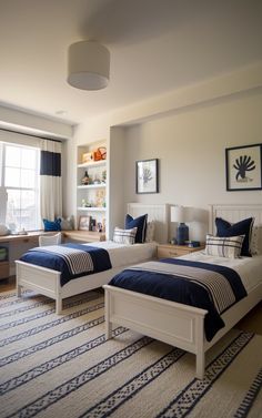 Looking for twin bedroom ideas for a compact space? Try these genius ways to fit two beds for siblings! 🌟🛌 #SmallSpaceHacks #TwinBeds #SharedRoomIdeas Rooms With Twin Beds, Twin Bedroom Ideas, Shared Boys Bedroom, Navy Accent Wall, Twin Bedroom Decor, Twin Boys Room, Room For Boys, Twin Beds For Boys, Twin Beds Guest Room