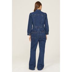 Blue denim (99% Cotton, 1% Elastane). Jumpsuit. Long sleeves. Collar. Front button closure. 32" inseam. 12" rise. Imported. Medium Wash Button-up Denim Jumpsuit With Buttoned Pockets, Medium Wash Denim Button-up Jumpsuit With Buttoned Pockets, Medium Wash Denim Jumpsuit With Buttoned Pockets, Utility Style Denim Jumpsuit For Work, Utility Denim Jumpsuit For Work In Medium Wash, Straight Leg Overalls With Button Closure For Workwear, Medium Wash Denim Jumpsuit With Button Closure, Medium Wash Denim Overall Jumpsuit With Button Closure, Fitted Cotton Utility Denim Jumpsuit