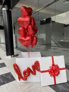 two valentine's day greeting cards with red balloons in the shape of love