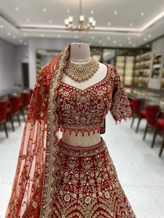 This bright red bridal lehenga BL-134 is the perfect choice for your big day. The intricate detailing of pearls, blush pink and gold stones adds a touch of elegance to the traditional design. Expertly crafted, this lehenga is sure to make you stand out and shine on your special day! Fabric: Velvet! WASH CARE INSTRUCTIONS - Please Dry clean only when it is applicable! Ready to Ship! Red Bridal Lehenga, Cutdana Embroidery, Bridal Lehenga Red, Green Street, Fashion Vocabulary, Designer Outfits, Bridal Stores, Long Skirts, Indian Designer Outfits