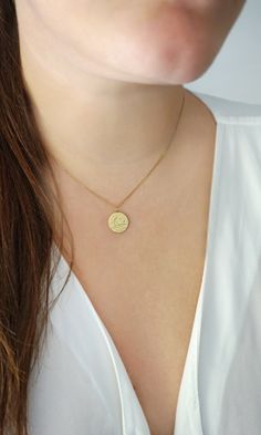 14mm 14K 9K Delicate Sun and Moon Necklace, Solid Gold Disc Necklace, Reversible 2 Sided Sun and Moon Pendant, Dainty Minimalist Layering necklace, 9K gold sun and moon necklace, Gift for her, FREE EXPRESS SHIPPING Beautiful and delicate necklace with a disc charm engraved with a crescent moon on the one side and a sun on the other. The necklace is made in 14K or 9K solid gold. She's Like the Sun and the Moon Because even on the cloudiest of days... And darkest of nights... She still find the wa Minimalist Yellow Gold Charm Necklace With Moon Phase, Minimalist Yellow Gold Moon Phase Charm Necklace, Everyday Yellow Gold Sun And Moon Necklace, Yellow Gold Moon Necklace For Everyday, Everyday Yellow Gold Moon Phase Necklace, Everyday Yellow Gold Moon Necklace, Everyday Moon Shaped Yellow Gold Necklace, Everyday Round Charm Necklace With Moon Phase, Sun And Moon Pendant