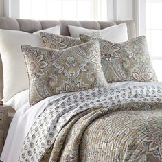 the comforter is neatly made and ready to be used in this bedding set