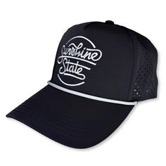 Our Sunshine State Script performance rope hat is lightweight, super breathable and the laser-perforated airflow makes it an ideal hat for warmer temperatures. The fit is just right for all. Our limited first run is available in black with grey embroidery. Performance poly fabric, five-panel design Laser-perforated side and back panels enhance airflow Woven grey rope along base of front panel Adjustable plastic snap closure - Part of the proceeds from the sale of this hat go to organizations tha Adjustable Breathable Sun Hat For Sports, Sporty Sun Hat With Upf 50+ For Sports, Sporty Breathable Sun Hat For Sports, Breathable Sporty Sun Hat For Sports, Black Breathable Outdoor Hat, Breathable Sports Sun Hat With Curved Brim, Breathable Sports Visor Sun Hat, Adjustable Flat Brim Sun Hat For Sports, Breathable Sports Sun Cap