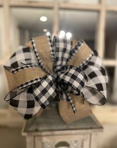 a black and white bow on top of a table