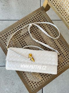 GIFT WRAPPING AVAILABLE - simply mark your order as a "gift" Introducing the Woven Clutch with Gold Pin by PattyB, a sophisticated blend of elegance and modern style, designed for the stylish woman who seeks both luxury and practicality. This best seller is more than just a handbag--it's a true fashion statement. With its unique braided design and sleek gold pin detail, this dumpling purse stands out as a chic accessory for any occasion. Its distinctive shape, combined with the woven texture, ma Knot Purse, Thoughtful Christmas Presents, Braided Bag, Woven Clutch, Statement Clutch, Stylish Women Fashion, Everyday Gifts, Gold Pin, Chic Accessories