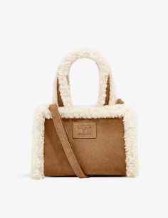 UGG X TELFAR - UGG X Telfar small suede tote bag | Selfridges.com Telfar Small Bag, Telfar Ugg, Telfar Logo, Winter Ugg, Suede Tote Bag, Suede Tote, Leather Cleaning, Jordan 1 Retro High, Brown Shoe