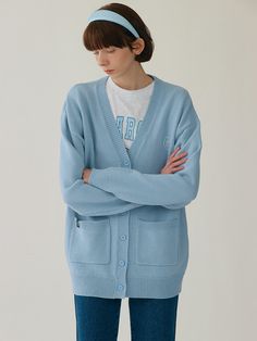 Editor's NotesThis is rolarola's trusty basic knit cardigan with all classic details imbued with a soft light blue color. Designed in v-neckline, ribbed edges, and tonal front button fastenings, this piece has a slouchy dropped shoulders for a easy silhouette that is soft and comfortable to wear all year around.- Cardigan with v-neckline- Tonal front button fastenings, ribbed edges, dropped shoulders, over-the-hip length- Front pockets, soft, stretchy, and midweight fabric- Slouchy and relaxed s Easy Silhouette, Light Blue Color, Soft Light, Hip Length, Soft Lighting, Drop Shoulder, Knit Cardigan, Light Blue, Blue Color