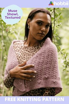 a woman wearing a pink knitted shawl with the words free knitting pattern on it