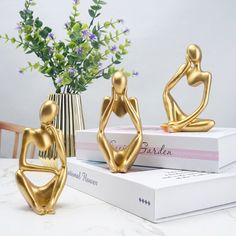 PRICES MAY VARY. Golden Thinker Statues Set measured at 5.12" tall, just the right size, simple but artistical thinker figurines, Great Modern Art Sculpture Home Decor Accent This resin thinker statue can easily decorate your home, living room, bedroom, bathroom, office, coffee shop etc., A Great Tabletop Decorative Ornament This little gold thinker figurine designed with exquite craftmanship, adding stylish fashion to your place, definately an eye-catching in your friends or customers This abst Abstract Statue, Desk Coffee, Cabinet Table, Mold Casting, Gold Home Decor, Spiritual Decor, Decor Figurines, Bookshelf Decor, Hotel Decor