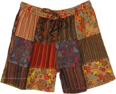 These hippie mushroom patchwork shorts are the perfect way to add a touch of free spirit flair to your nature vacation wardrobe. Made from 100% cotton, they are soft, comfortable, and breathable. #tlb #Patchwork #vacationclothing #bohemianfashion #Handmade #BohoShorts #HippieShorts Beach Patchwork Cotton Shorts, Multicolor Patchwork Shorts For Festival, Patchwork Cotton Shorts For Beach, Hippie Multicolor Shorts, Multicolor Hippie Shorts, Cotton Patchwork Shorts For Beach, Multicolor Patchwork Cotton Shorts, Patchwork Cotton Shorts For Vacation, Cotton Patchwork Shorts For Vacation