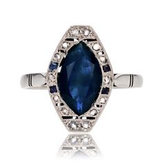 an oval shaped blue sapphire and diamond ring