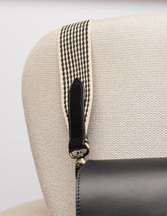 Freshen up your favorite bag by swapping out the strap for our Black and White Checkered Webbing Strap. The brass-colored clasps combined with black and white webbing make this strap a timeless but edgy alternative for every other strap you have. Personalize your O My Bag and make it last even longer. All O My Bags with a detachable strap design can be styled with the Checkered webbing strap. Give your outfit just that little bit extra. OMB-CHECKEREDBLACKSTRAP My Bags, Black Leather Bag, Sustainable Leather, Antique Brass Hardware, Webbing Strap, Aging Beautifully, My Bag, Black Leather Bags, Strap Design