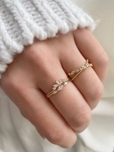 This charming ring features 3 horizontal marquise crystals with beaded detailing. MATERIALS:   - Cubic zirconia  - 14k Gold/ Rose Gold / Rhodium Plated, Brass  Follow us on INSTAGRAM @statementgrey Gold Ring Stacking, Cute Promise Rings, Fancy Jewellery Designs, Marquise Ring, Ring Crystal, Fancy Rings, Gold Rings Fashion, Jewelry Accessories Ideas, Jewelry Fashion Trends