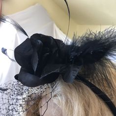 Fascinator Hat, Black Velvet, Silk Roses, Stripped Goose Feathers, a Marabou Wispy Feather. Head Band and Hair Clip. Black Bird Cage Veil. This fascinator is fun to add to your hairdo for any special occasion or just to dress up your look. Wear in your hair or on a hat for a glamorous touch. Floral Arrangement Adjusts on Headband. Remove from headband and clip into hair. For other vintage and homemade items see: www.VeryVictorianStudio.etsy.com For sewing related items see my other shop: www.Sew Fitted Black Feathered Headpiece, Fitted Black Headpiece With Feathers, Fitted Black Hat Costume Accessories, Black Feathered Fascinator For Spring, Black Feather Headpiece For Spring, Black Feathered Mini Hats For Spring, Black Feathered Headpiece, Black Headband Costume Hats For Spring, Fitted Black Hair Accessories For Kentucky Derby