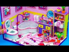 a toy bathroom with hello kitty furniture and accessories