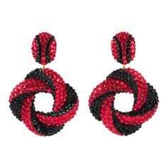 This is part of Chairish’s Costume Jewelry assortment.  Adorable statement clip-on earrings designed by Richard Kerr in the 1980s. They are made up of his signature pave rhinestones. Featuring a dimensional donut shape with a swirling design all covered with colorful crystal rhinestones on a black resin background frame. Vivid black and red colors. Brand tag at the back. Richard Kerr began designing jewelry in Dallas, TX in 1980. Measurements: 2.13 in wide (5.4 cm) x 3.25 in high (8.2 cm).  Plea Resin Background, Background Frame, Flower Girl Crown, Donut Shape, Black Jewel, Black Resin, Chanel Vintage, Handmade Jewelry Diy, Vintage Clip