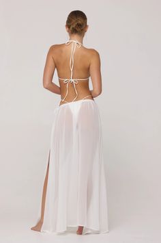 Athena Skirt in White – RESA Elegant Flowy Maxi Length Cover-up, Elegant Backless Beach Dress For Beach Party, White Maxi Skirt For Beach, Backless Beachwear Bottoms For Beach, White Skirt For Beach Season Party, Chic White Maxi Skirt For Beach, Chic White Maxi Skirt For The Beach, White Party Skirt For Beach Season, White Beach Party Skirt