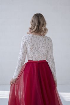 "Default features of this skirt: * It consists 3 tulle layers, fully lined in bridal satin. * Not gathered at the waist, completely flat. * Slim A line silhouette. * Non hand dyeable, but a vast color selection available. * Lining in half circle, wide and flowing. * Features a default train of 16\" or 40cm, can be slightly longer, shorter or none at all. * Tailored satin waistband, 1\" or 2.5cm waistband by default, matches the inner layers of the skirt by default, but can also be done otherwise Red Tulle Bridesmaid Dress, Elegant Red Dress With Tulle Skirt, Red Tulle Dresses For Prom Season, Elegant Bridesmaid Dress With Flared Skirt, Elegant Tiered Skirt For Prom, Elegant Bridesmaid Dress With Tulle Skirt, Elegant Tulle Dress With Lined Skirt, Elegant Dress With Lined Tulle Skirt, Elegant Tulle Skirt For Gala