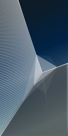 an abstract image of lines and curves against a dark blue sky with no clouds in sight