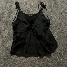 Brand New Never Worn Black Silk Halter Top, Chic Black Vacation Blouse, Chic Black Blouse For Vacation, Black Summer Blouse For Going Out, Black Spring Top With Ruffled Straps, Black Top With Ruffled Straps For Spring, Black Top With Ruffled Straps For Summer, Elegant Black Blouse For Vacation, Spring Tops With Ruffled Straps For Night Out