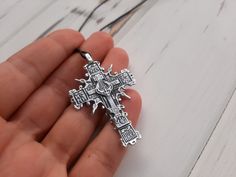 "A copy of the historical findings. The Cossack cross. 16-18 century Description: Double-sided pendant Metal: silver 925 Weight: approx. 9 g Size: approx. 5,5 x 3,4 cm \\ 2,16\" x 1,33\" Hole size: 2 mm \\ 0,07'' The product will be shipped complete with a cotton cord black color. Link to the bronze Cossack cross - https://www.etsy.com/listing/518140789/cossack-cross-pectoral-cross-pendant?ref=listings_manager_grid *The color of real item may be a little different from the pictures due to the di Pectoral Cross, Pagan Necklace, Tiny Necklace, Norse Jewelry, Pagan Jewelry, Bronze Pendant, Christian Cross, Cat Pendants, Viking Jewelry